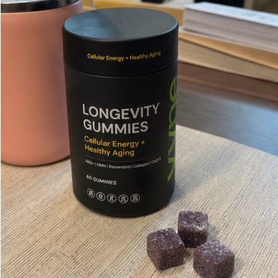 Customer selfie holding VYNE gummies